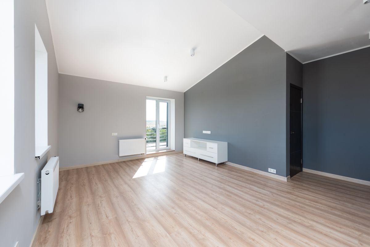 Temporary stock photo of a clean empty apartment room after turnover cleaning.